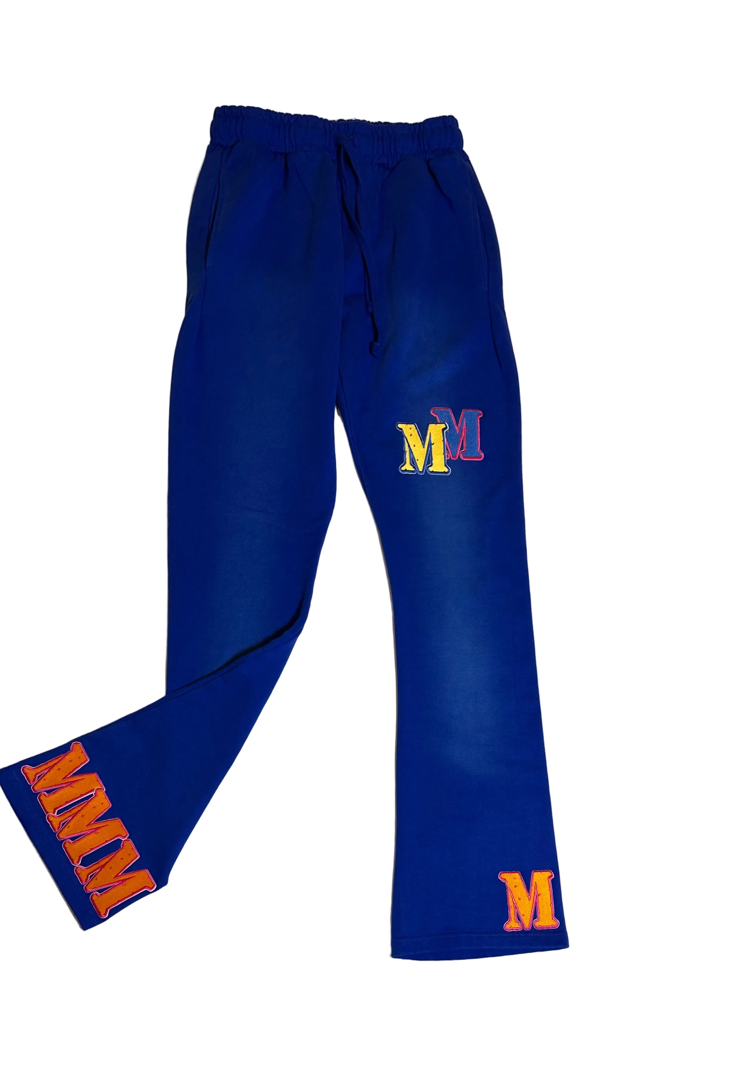 Blue sweatpants with 'M' logos on a light gray background