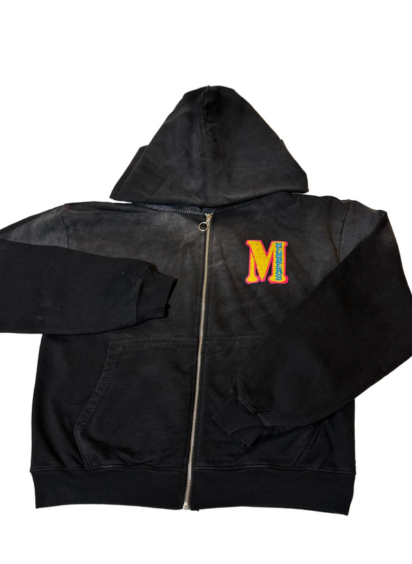 Black hoodie with a colorful 'M' logo on the chest against a white background